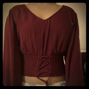 A maroon top